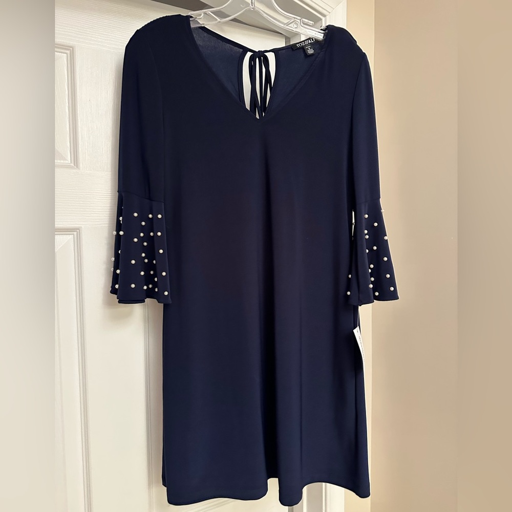 Dress.  Brand new.  Size petite small.  Navy with small Pearl details.